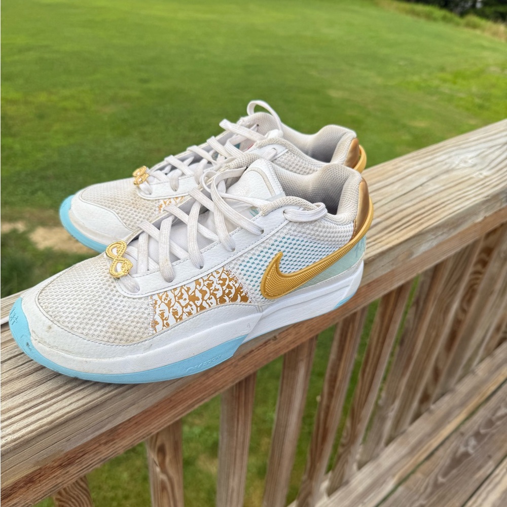 Nike Gold and White Sneakers with Blue Soles